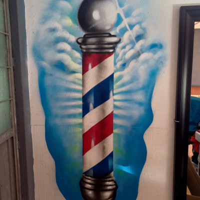 Mural de graffiti en Puebla - bares, barberias